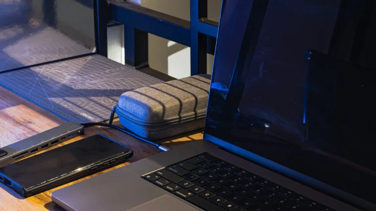 Digital marketing specialist working in a dark modern office for a Dubai specialist versus agency comparison